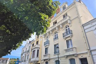 APPARTEMENT F4 DE CARACTERE AVEC CAVE ET MANSARDES - VICHY CENTRE